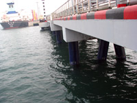 青岛港钢桩PTC包覆修复完成